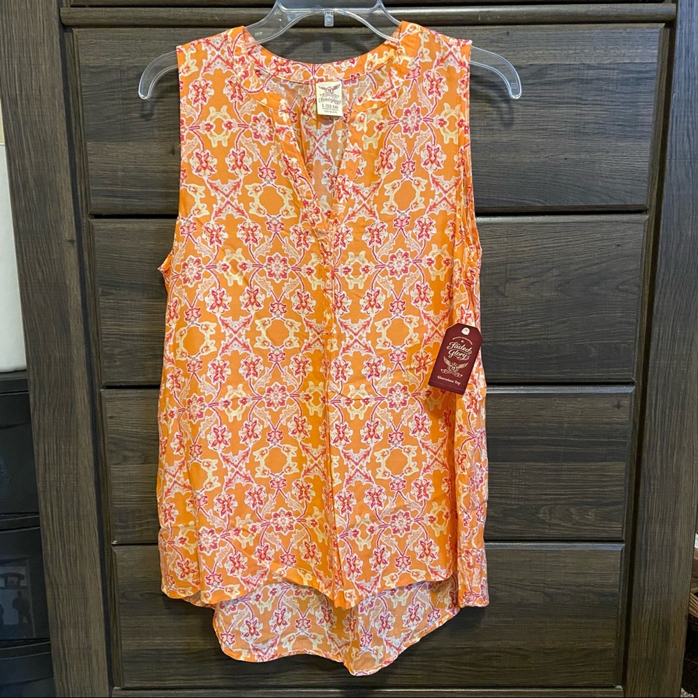 Unavailable. Sleeveless geometric pattern tunic